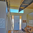 Custom steel handrails on a loft ladder with top and bottom mounts.