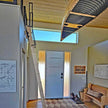 Custom steel handrails on a loft ladder with a top mount.