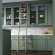 Meadow Lane ladder hardware on a rolling ladder in black.