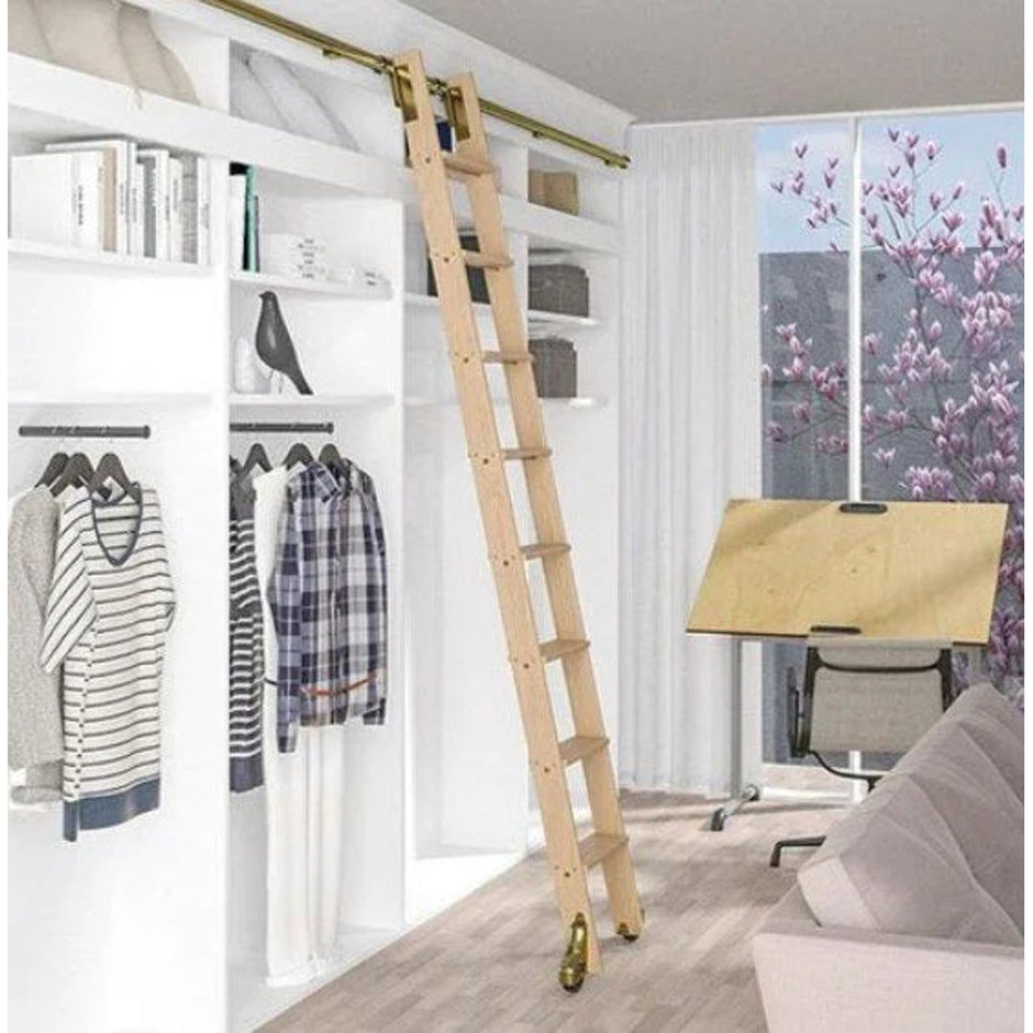 Meadow Lane ladder hardware on a rolling ladder in polished brass.